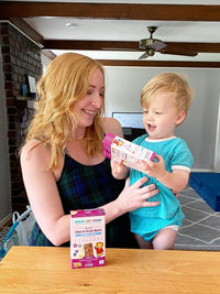 Baby Maliyah and Mom explore a new box of RSF! Blueberry Banana bars