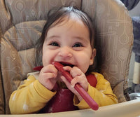 Baby Sunshine enjoys some puree with allergens