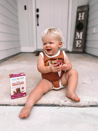 Baby Larky enjoys an RSF! Apple Cinnamon fruit and oat bar