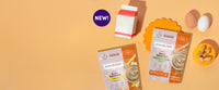 2 pouches of baby oatmeal with 3 allergens viewed on a table top from above